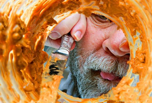 _rf_photo_of_mature_man_scraping_peanut_butter_jar.jpg