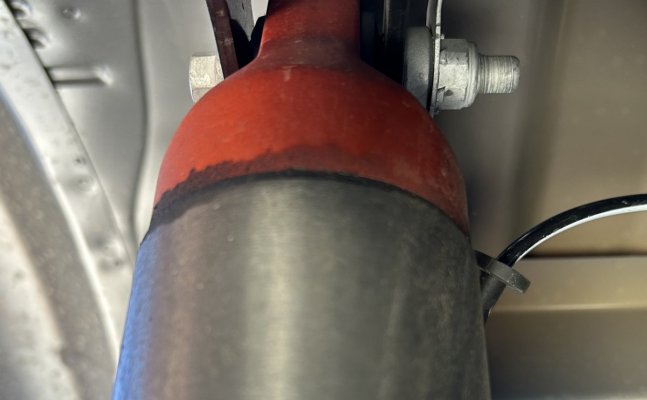 RR shock leak front view.jpg